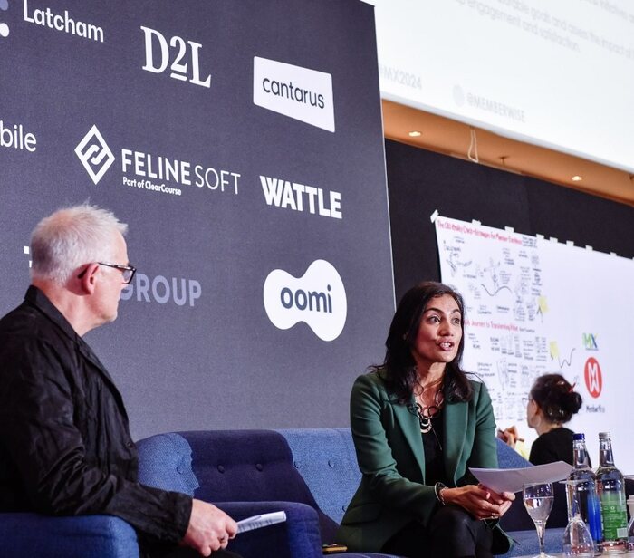 Devi Virdi in conversation on a conference panel
