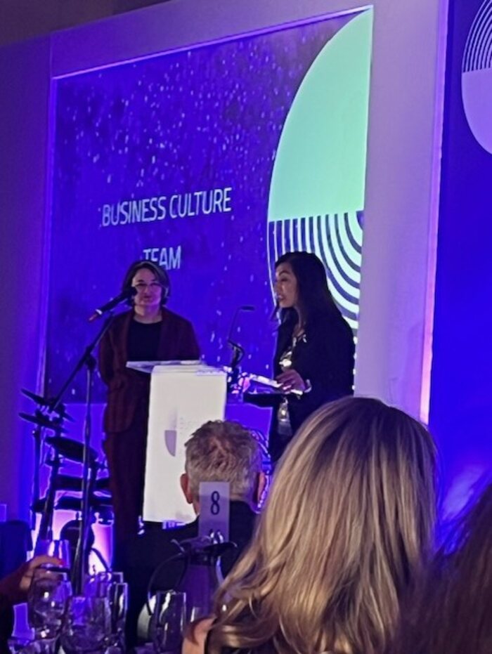 Devi Virdi receiving a Business Culture award